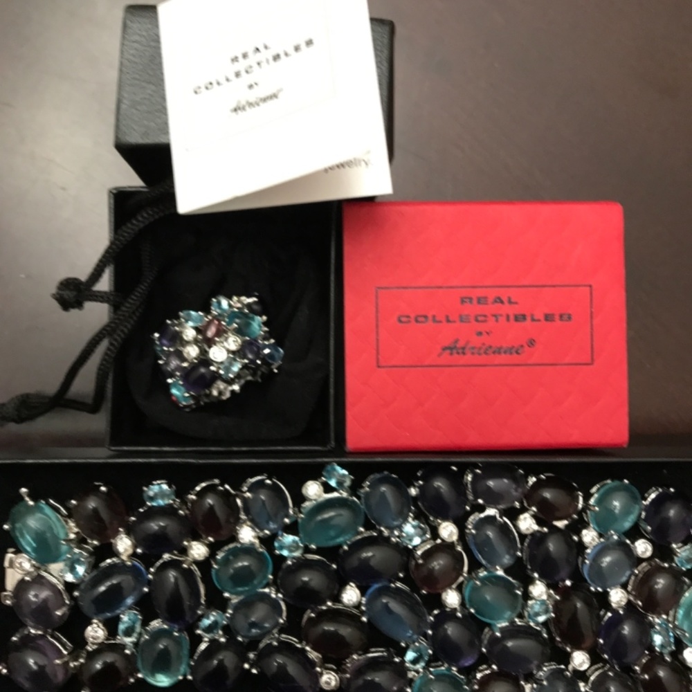 Adrienne Real Collectibles Jewelry Set Blues/Purples/ CZ’s in a silver setting.